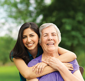 Two women smiling. Links to Gifts That Pay You Income